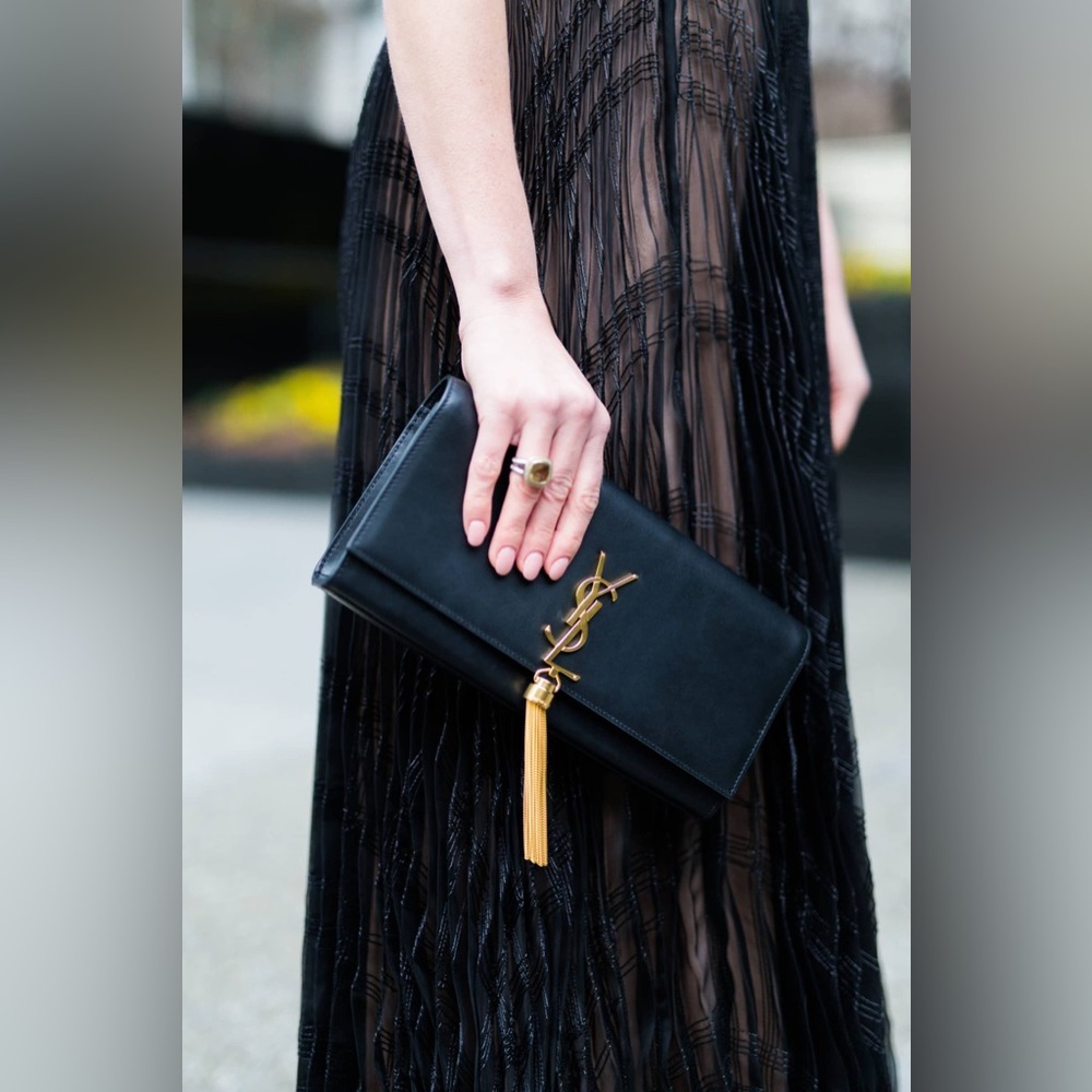 SAINT LAURENT Kate tassel-detail leather clutch bag